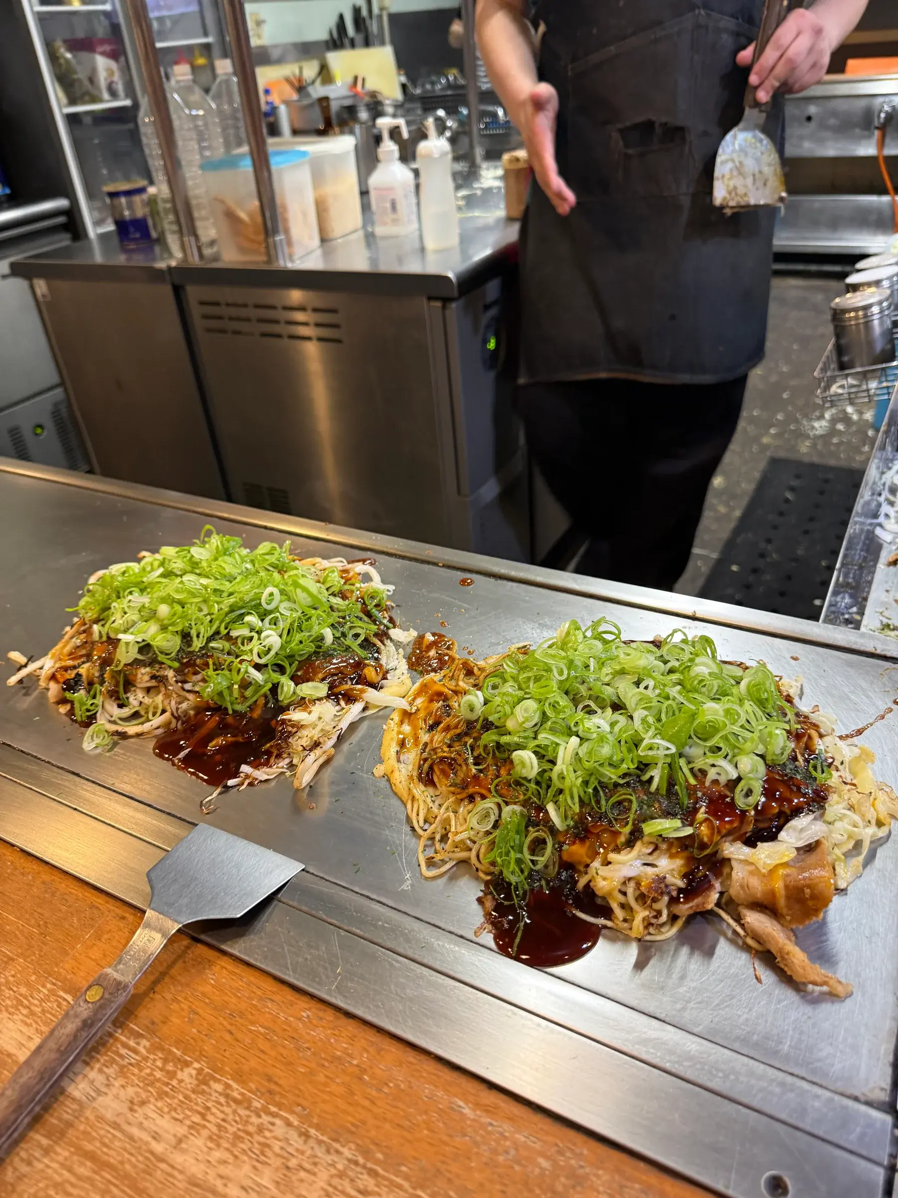 お好み焼き(okonomiyaki) - noodles and cabbage stir fried, Hiroshima style. The Hiroshima style stacks the ingredients in layers unlike the Osaka style.
https://maps.app.goo.gl/wf2EdArmoMTiPNeP6?g_st=ic